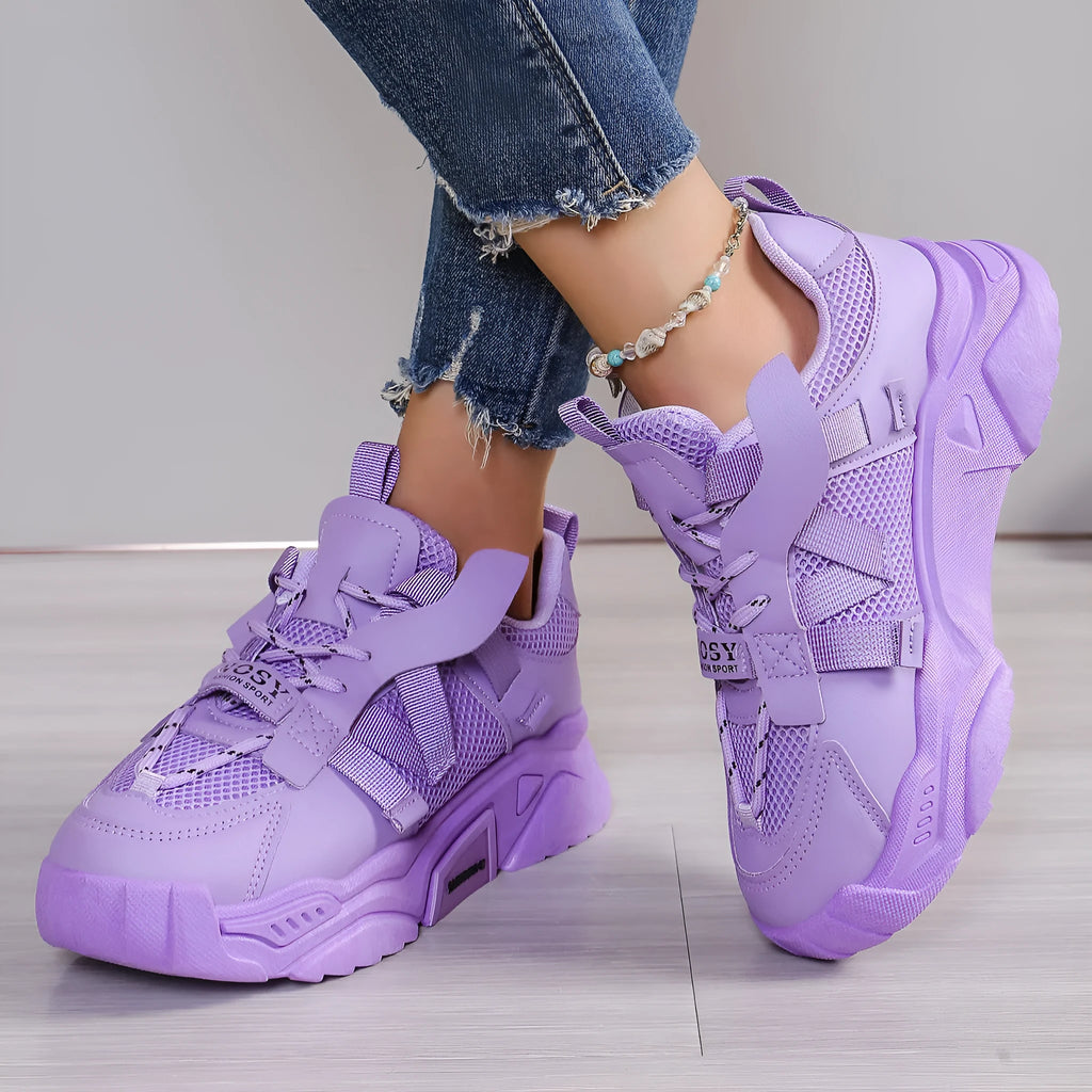 Women's purple platform mesh dad shoes with animal pattern and front lace-up.