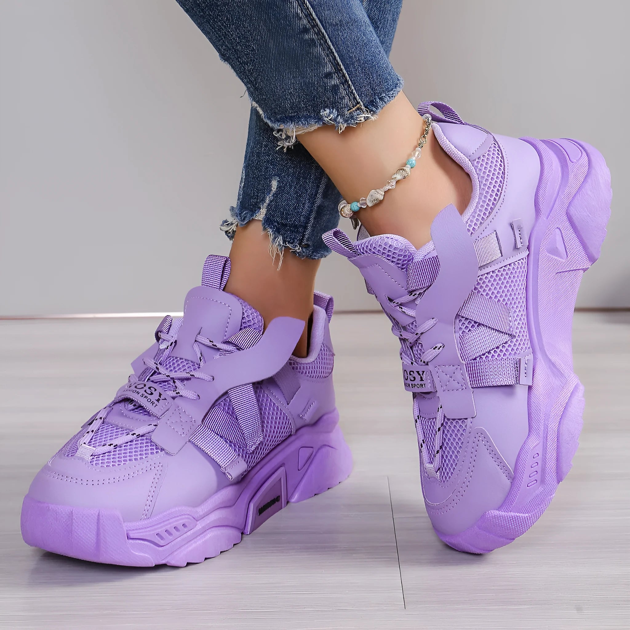 Women's purple platform mesh dad shoes with animal pattern and front lace-up.