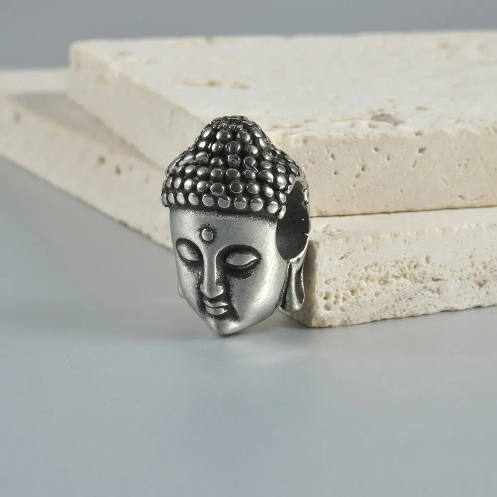 Personalised stainless steel hollow skull Buddha earrings in geometric design