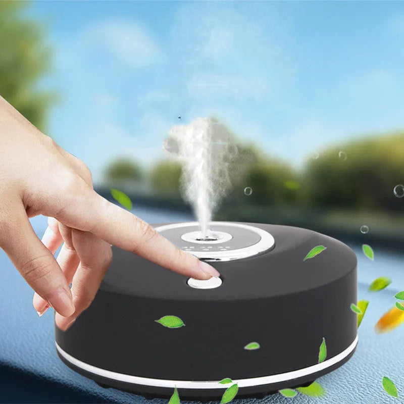 USB-powered vehicle mounted air freshener diffuser in black plastic with charging cable and anti-slip pad
