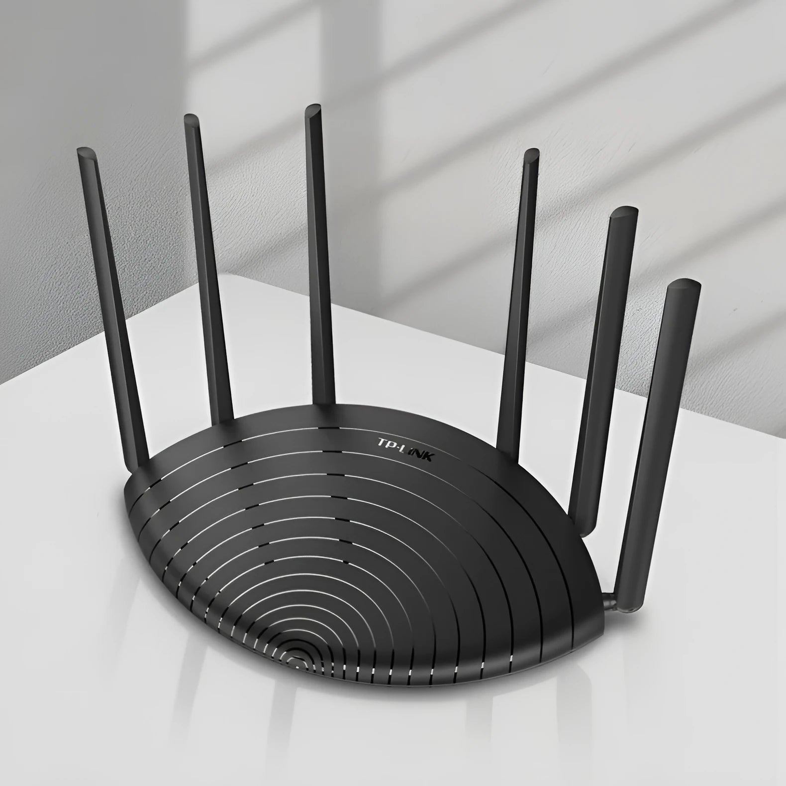 TL-WDR7661 Gigabit Edition AC1900 wireless home router with compact black design.