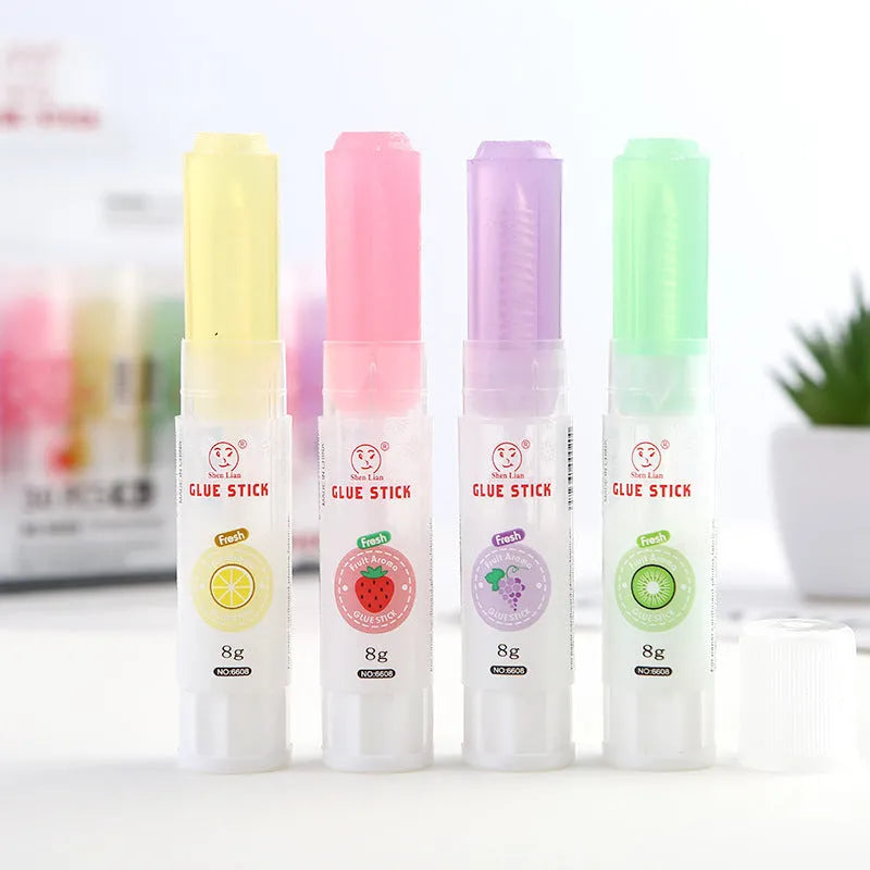 Two jelly solid glue sticks in bright colours for student crafts and handmade projects