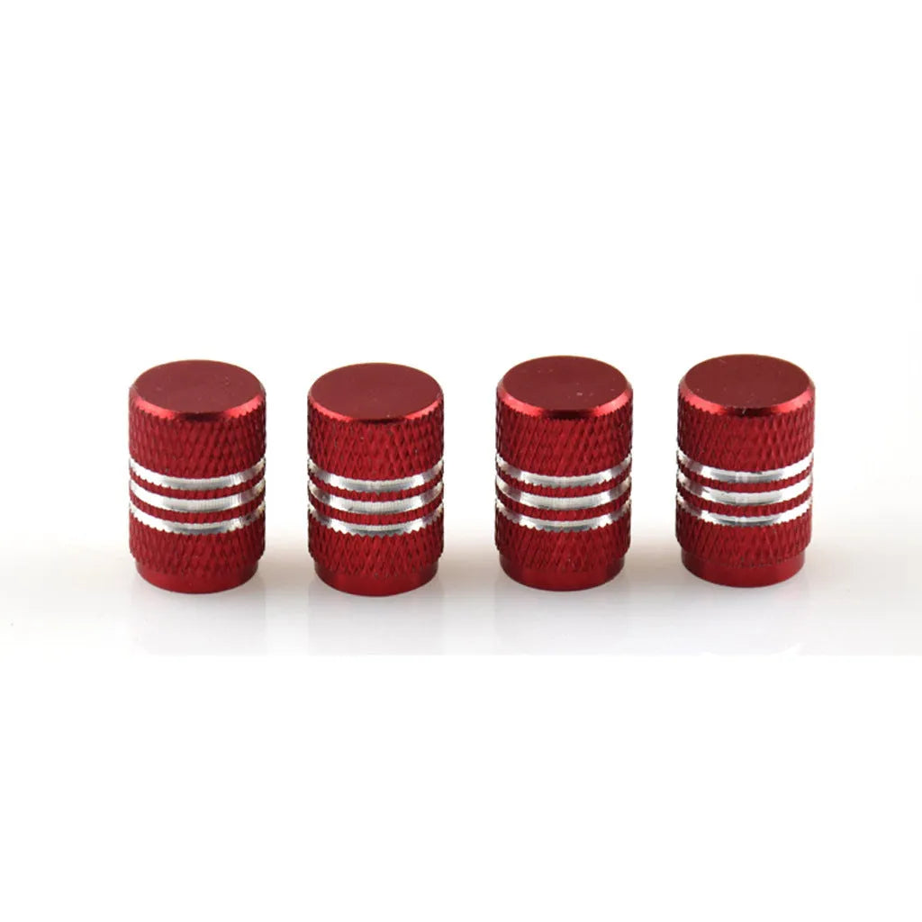 Set of coloured aluminium alloy car tyre valve caps in black, red, blue, gold, silver, green, purple, sky blue, grey, and orange