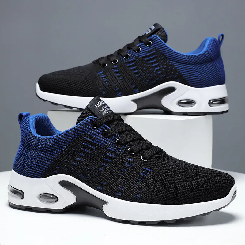 Men's Flyknit mesh low-top casual sneakers in black and grey colourway with lace-up front.