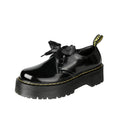 Women's thick-soled leather shoes with decorative ribbon cross-straps in black colour option