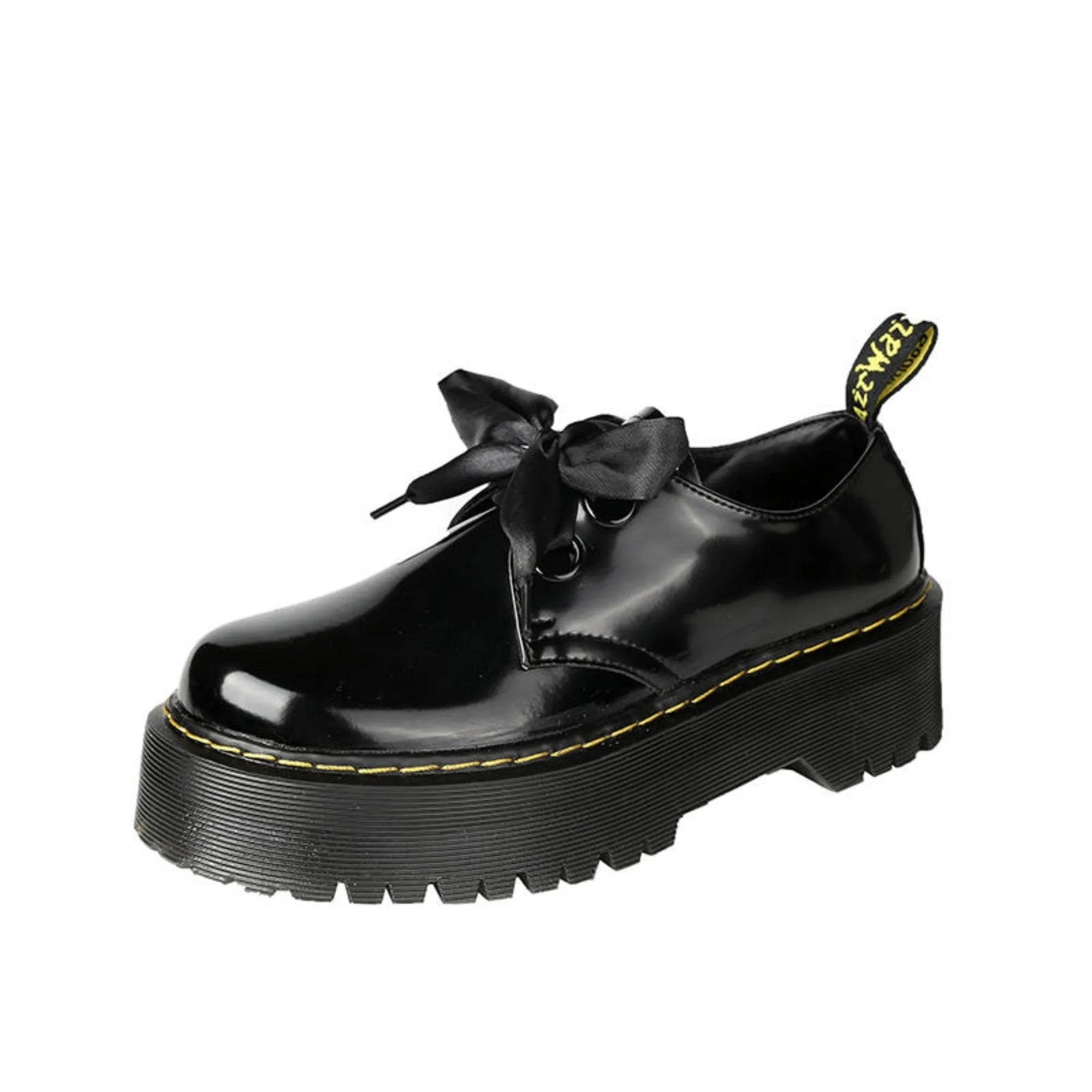 Women's thick-soled leather shoes with decorative ribbon cross-straps in black colour option