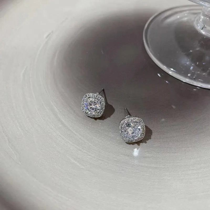 Square geometric diamond earrings for women in silver and gold colour options.