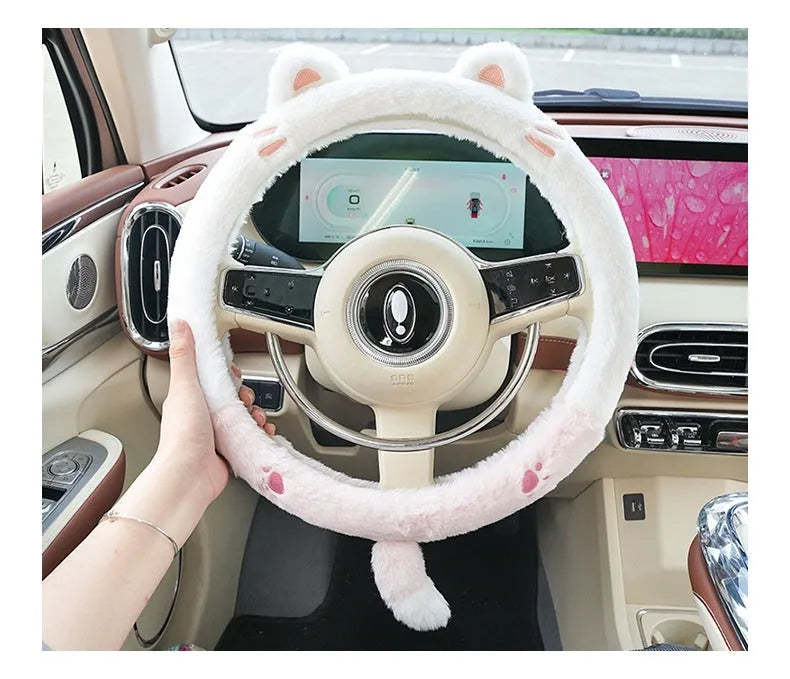 Plush winter steering wheel cover with embroidered cartoon bear design, sized for 38cm diameter wheels.