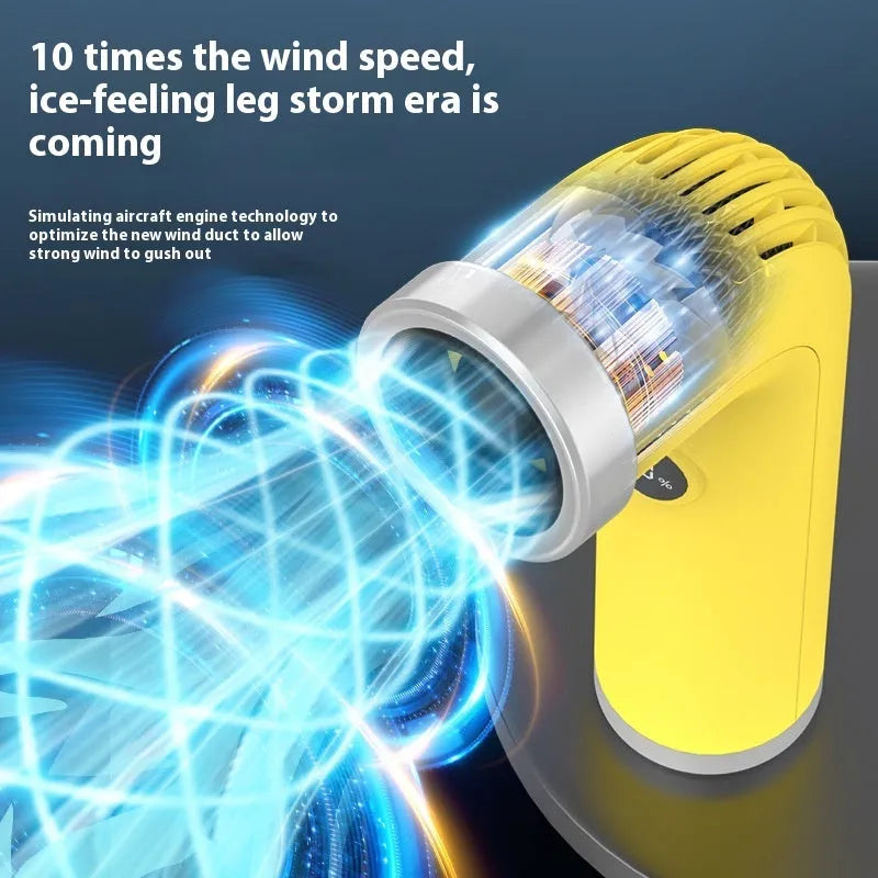 Apricot coloured bladeless portable turbine fan with power cord on a desk.