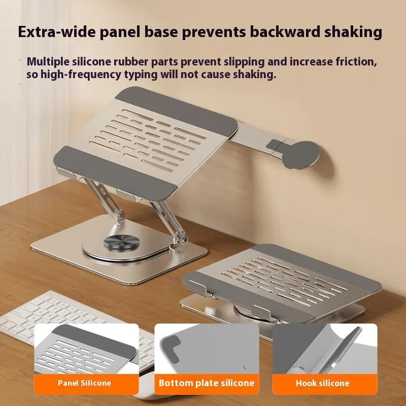 Silver carbon steel laptop stand with a rotating base and a side-mounted magnetic mobile phone holder.