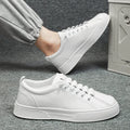 Men's low top sports casual shoes in black or white with synthetic leather upper and PVC soles