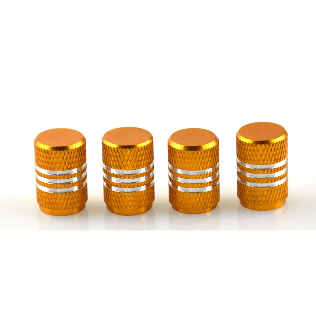 Set of coloured aluminium alloy car tyre valve caps in black, red, blue, gold, silver, green, purple, sky blue, grey, and orange