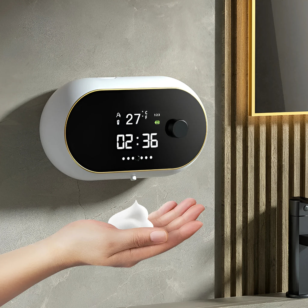 White automatic hand sanitizer foam dispenser mounted on wall with infrared sensor