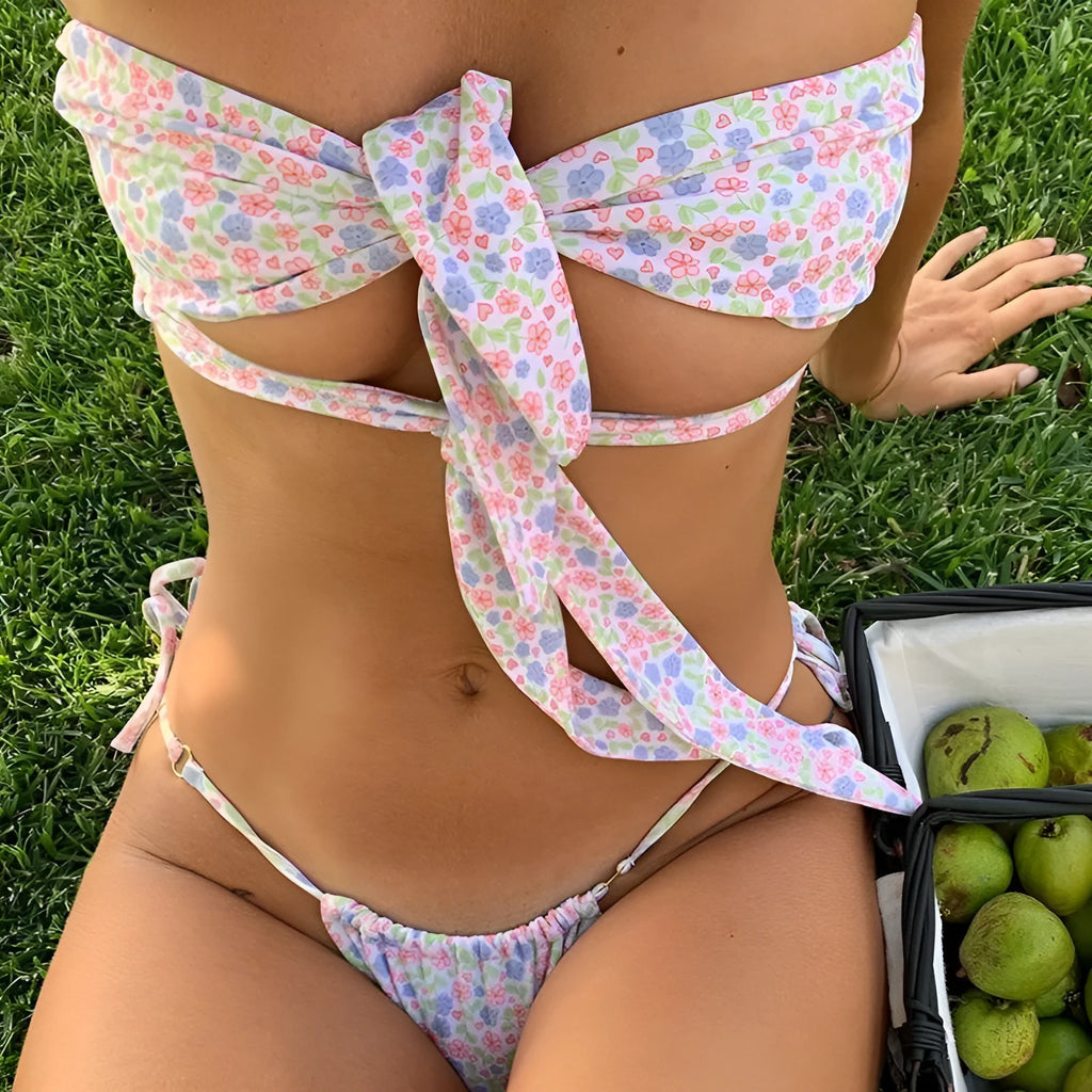 Women's lace-up front swimsuit with wireless cups and split leg briefs style in a floral print.