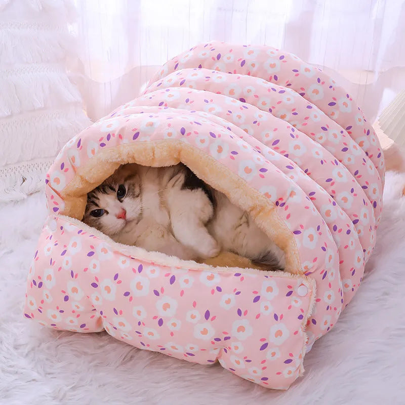 Enclosed winter cat bed with a removable cover in a floral pattern, shown in small and medium sizes.