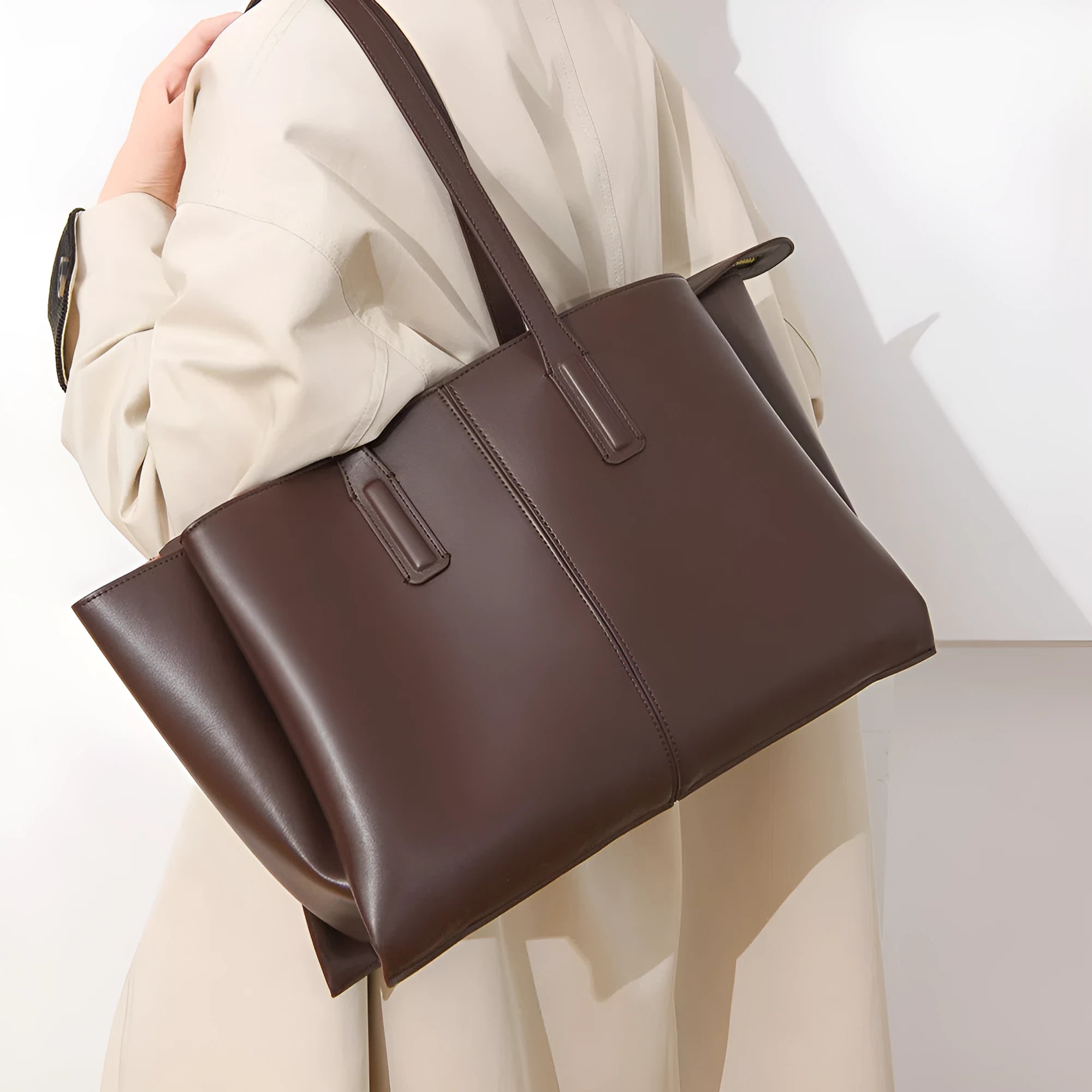 PU leather large-capacity horizontal rectangle bag in urban minimalist style with stitched seams and double shoulder straps
