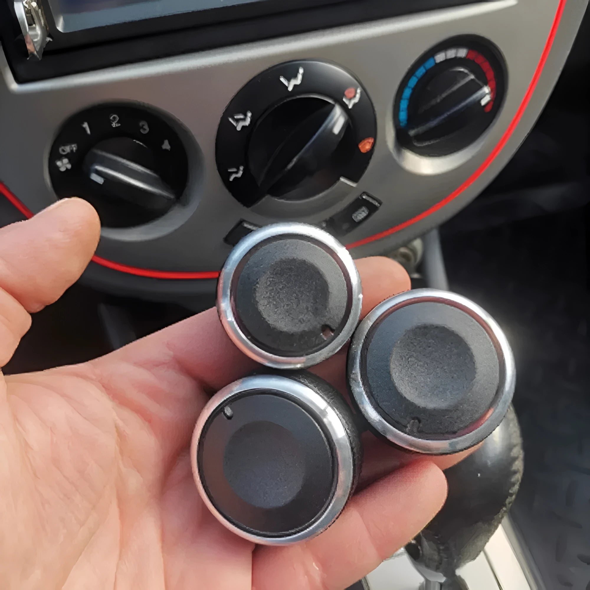 Three black aluminium alloy Chevrolet Lefeng and Lechi air conditioning replacement control knobs