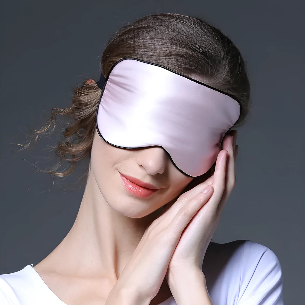 Double-sided mulberry silk eye mask with embroidered print in a choice of colours.