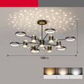Black 13-head Nordic star iron chandelier with remote control on a table
