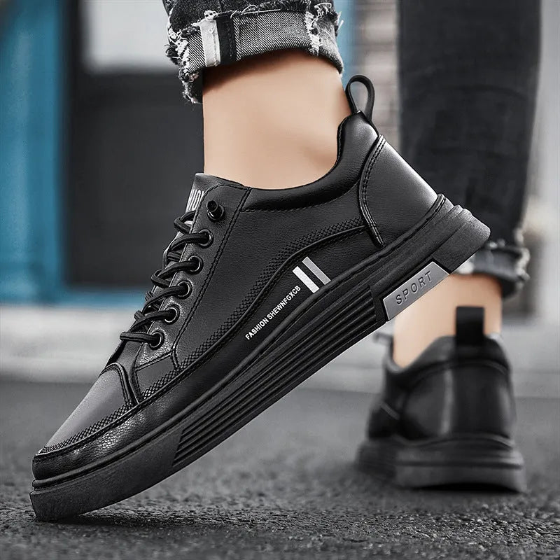 Men's white and black low-top skate shoes with elastic band and round toe.