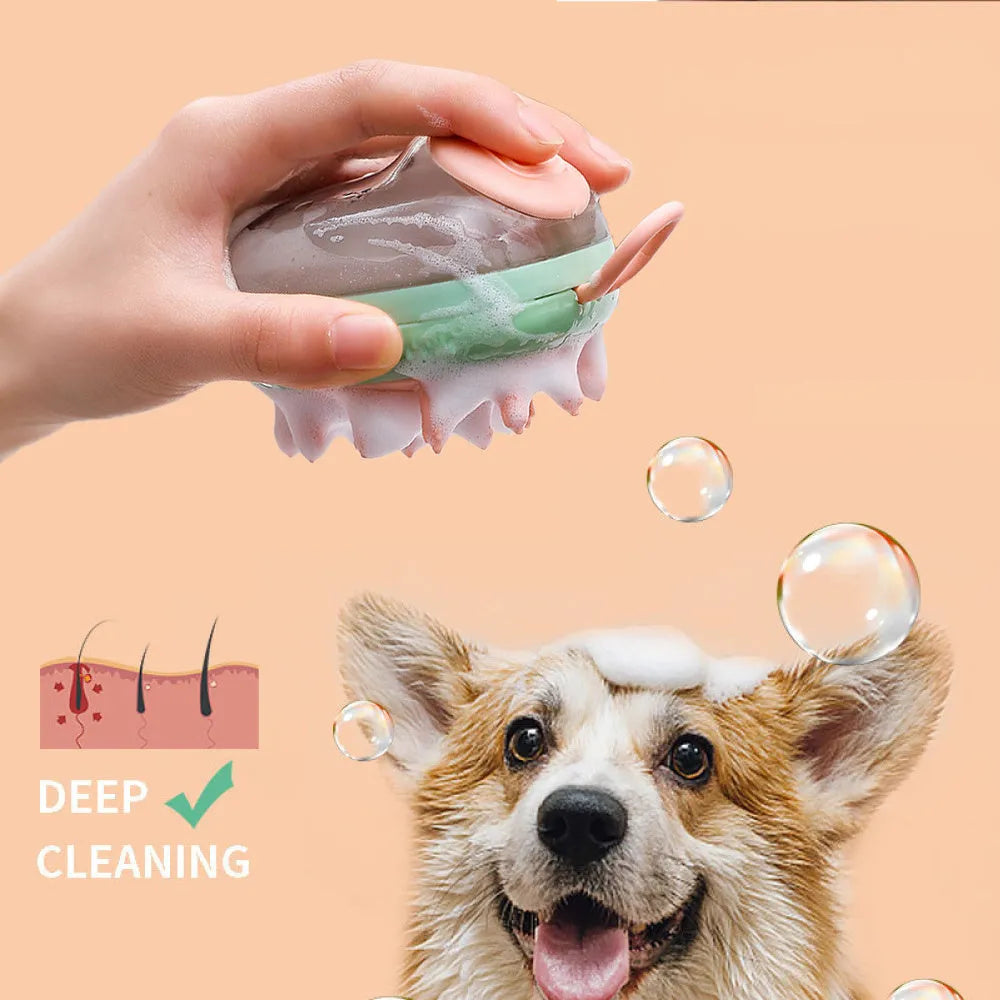 Blue and green pet bathing brush with integrated shampoo dispenser and silicone bristles.
