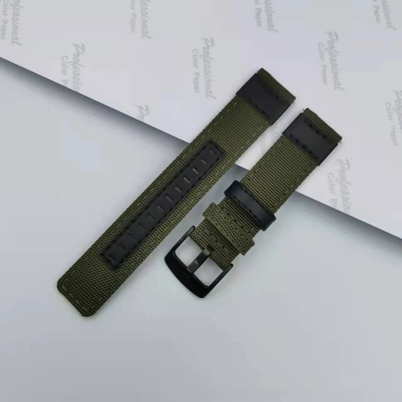 Oxford cloth canvas watch strap with quick-release bars shown in camouflage colour.