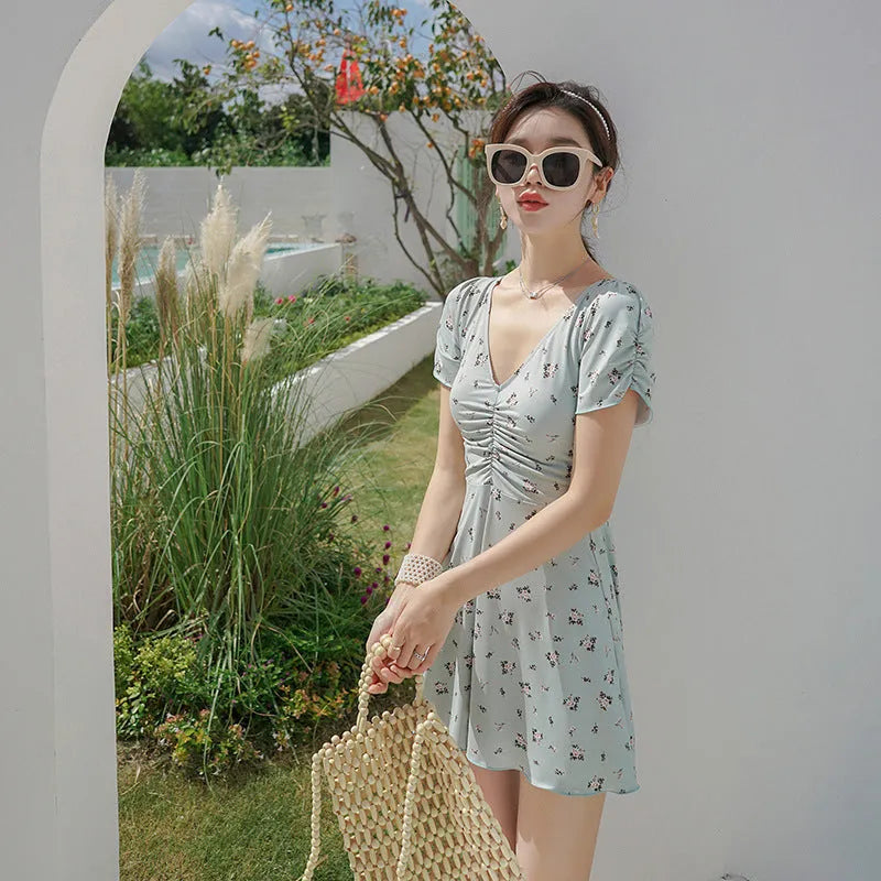 Green gathered fairy-style one-piece swimsuit with backless design and high elasticity for sports and swimming