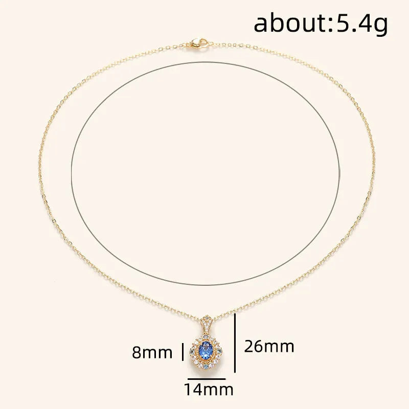 Golden women's necklace with a sparkling zircon inlaid gemstone pendant on an adjustable box chain.